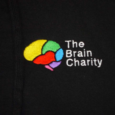 Colourful sewn logo on The Brain Charity sweatshirt