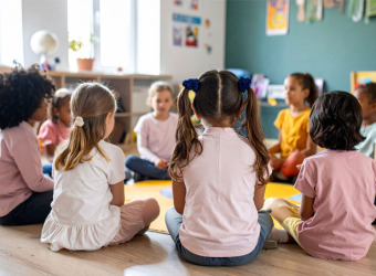 A group of children sitting in a circle