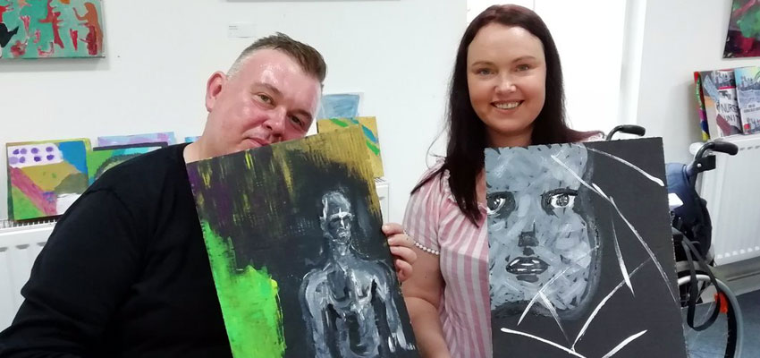 Sarah, on the right, enjoying an art class at The Brain Charity in Liverpool