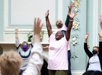 A community group participates in a Music Makes Us! Dance class from The Brain Charity in Liverpool