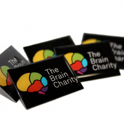 The Brain Charity metal pin badge with logo