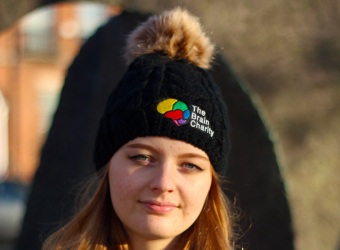 Keeping warm with The Brain Charity branded bobble hat