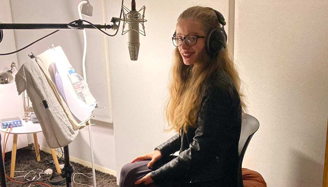 Ella recording her poetry