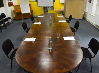 Boardroom style meeting room at The Brain Charity in Liverpool