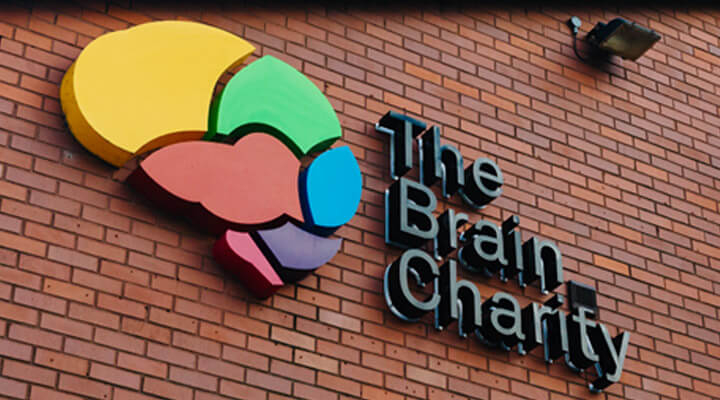 The Brain Charity logo on the wall of the building in Liverpool