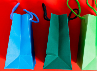 shopping bags against red background