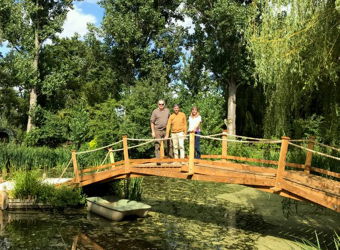 Steve his cousin Simon and Simon's wife Vanessa on the finished bridge