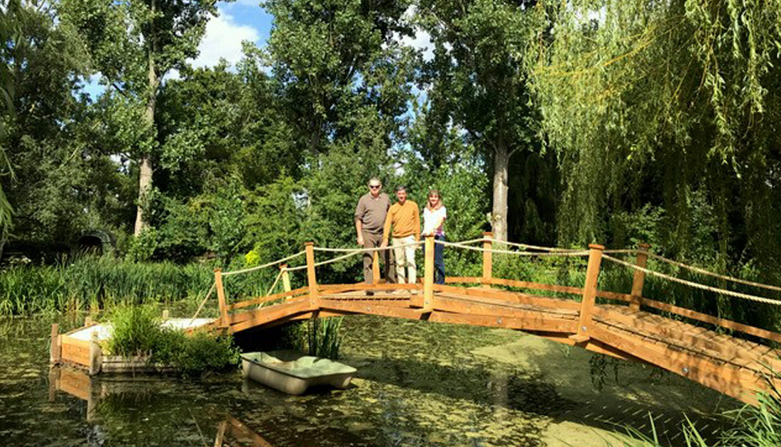 Steve his cousin Simon and Simon's wife Vanessa on the finished bridge