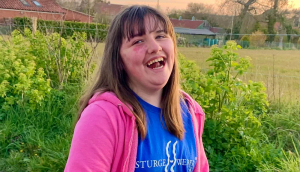 Angelina outside wearing her Sturge Weber syndrome T-shirt