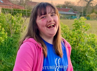 Angelina outside wearing her Sturge Weber syndrome T-shirt