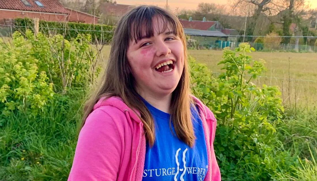 Angelina outside wearing her Sturge Weber syndrome T-shirt