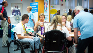 People enjying a meeting at The Brain Charity