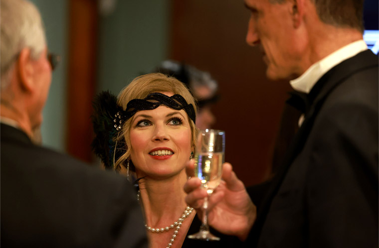 Ballgoers chatting at The Brain Charity Roaring 20s Ball 2022