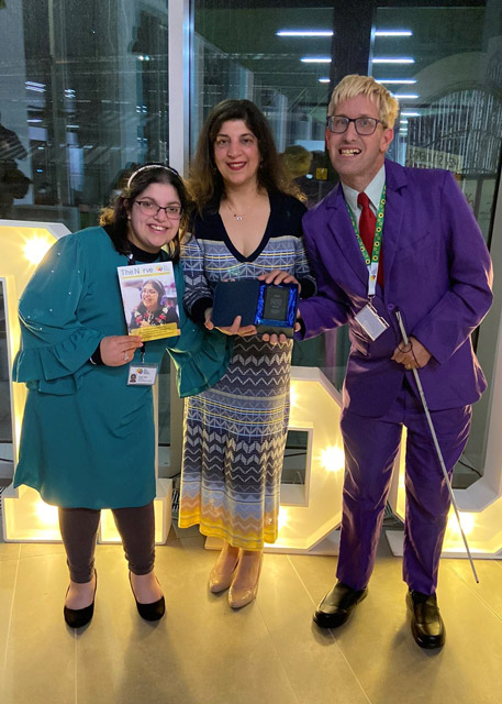 Amber, Naheed and Andrew with the award.