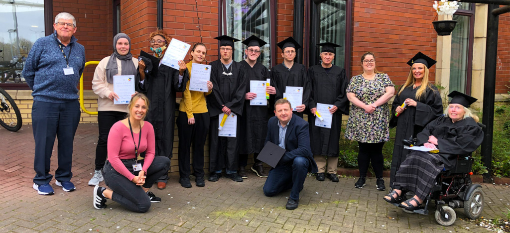 John with the rest of his Neuro-versity intake at their graduation ceremony