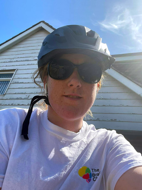 Fundraiser Roisiin wearing a cycle helmet