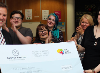 Quilter Cheviot making a corporate donation to The Brain Charity