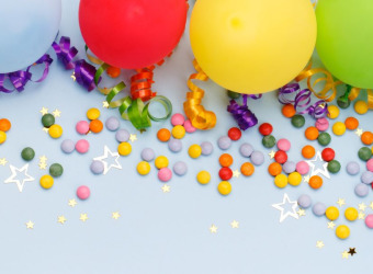 Colourful balloons and sweets image for The Brain Charity's annual celebration event on 22nd November 2022