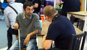 Rupak getting advice at The Brain Charity in Liverpool