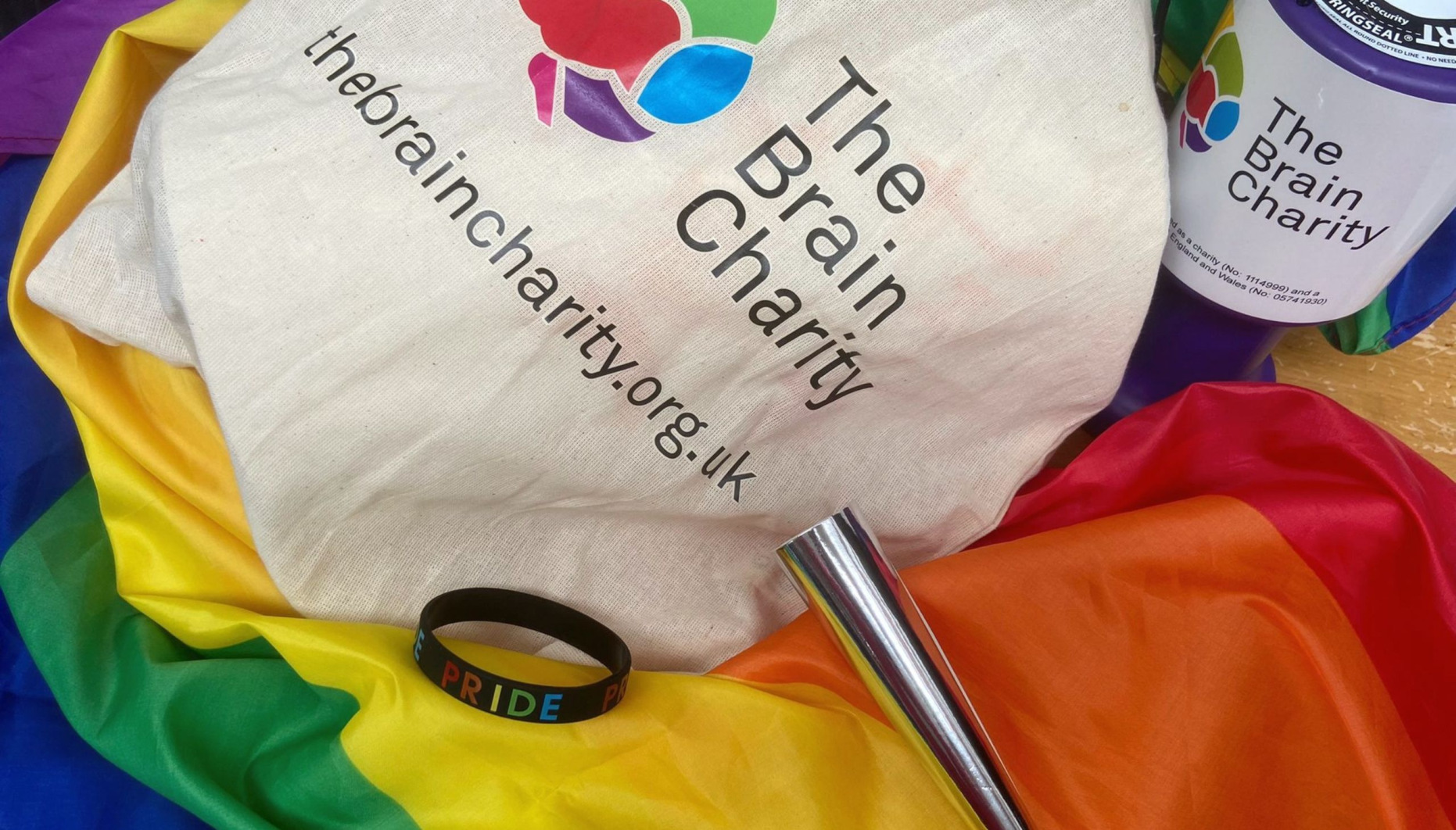 Rainbow flag on The Brain Charity's stand at Liverpool Pride 2022
