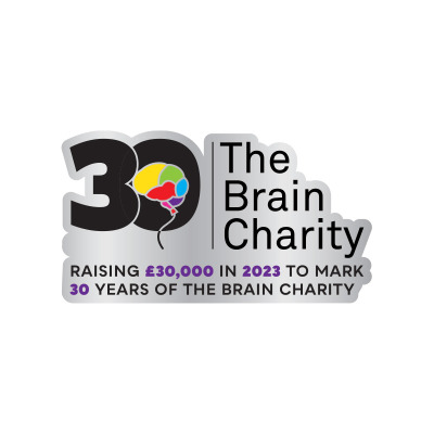 Front of The Brain Charity's 30th anniversary pin badge