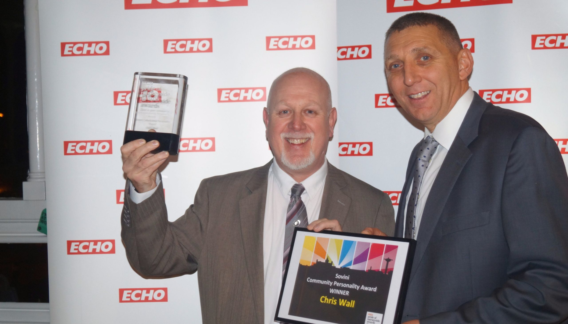 Chris being presented with his Pride of Merseyside award at a ceremony held by The Liverpool Echo