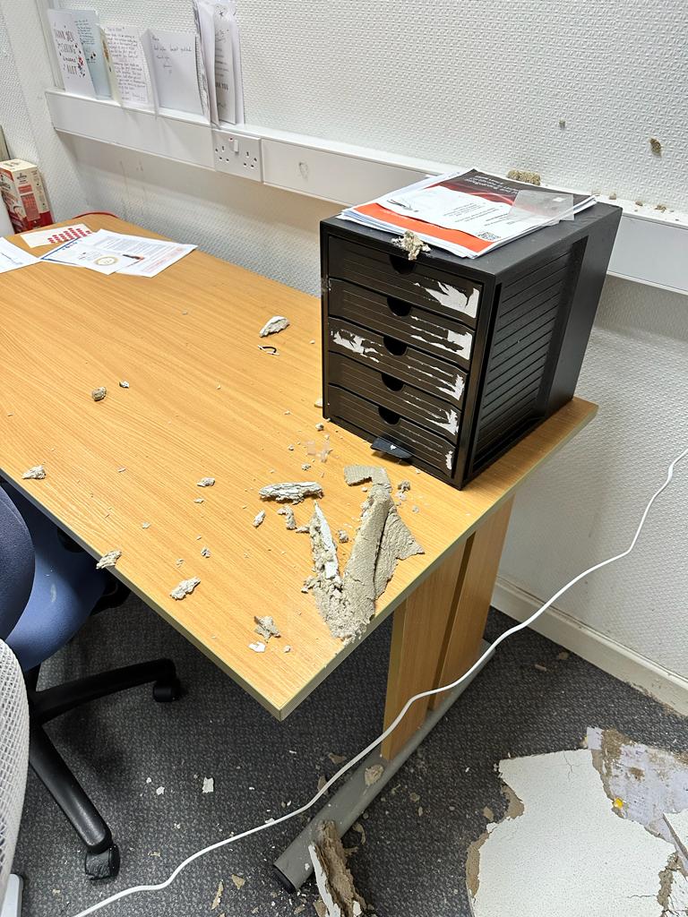 Rain damage to The Brain Charity offices caused by a collapsed ceiling from the leaking roof
