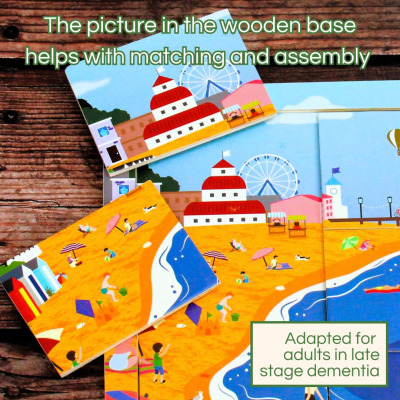 An accessible wooden jigsaw puzzle with a picture of a classic seaside scene.