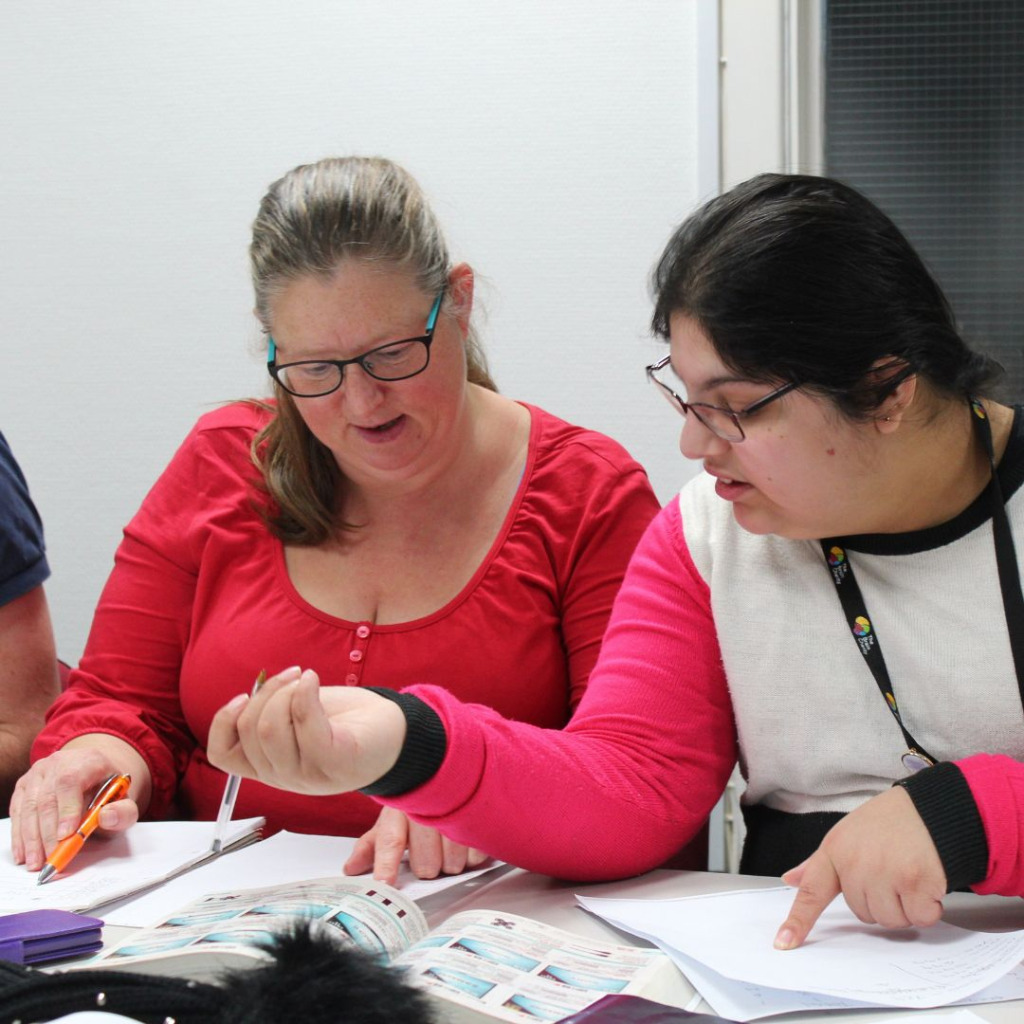 Corporate volunteer teaching skills at The Brain Charity