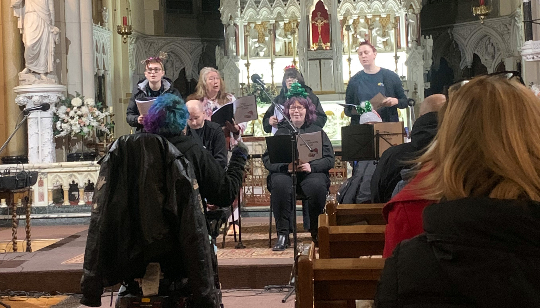 The Brain Charity choir performing in St Francis Xavier Church, Liverpool