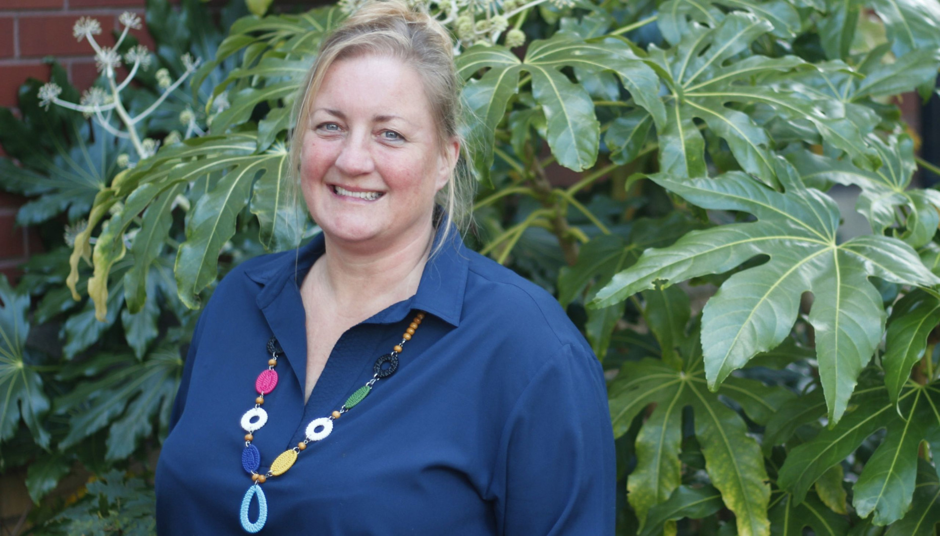 The Brain Charity's CEO Pippa Sargent standing outside and smiling