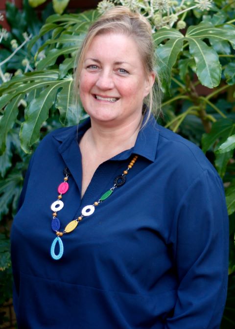 The Brain Charity's CEO Pippa Sargent standing outside and smiling