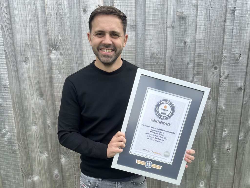 Neil with his work record plaque