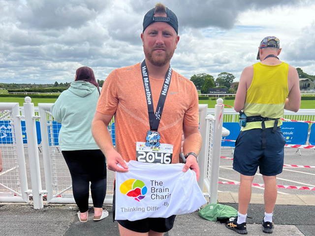 Aintree Half Marathon finisher with Brain Charity T-shirt