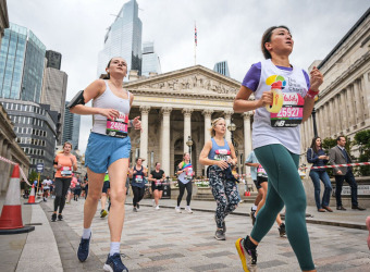 Christine, in Brain Charity running shirt, running the race in London