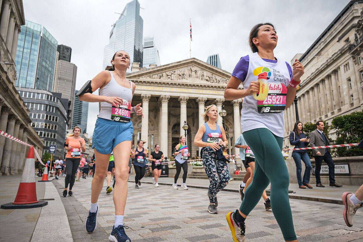 Christine, in Brain Charity running shirt, running the race in London