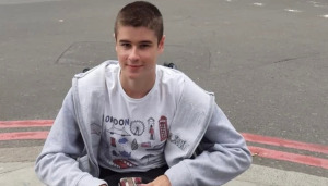 Liam posing for picture in his wheelchair (1)