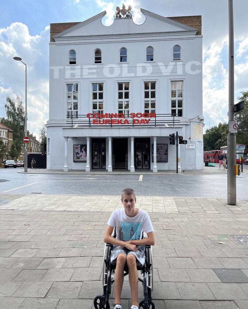 Liam posing for picture in his wheelchair