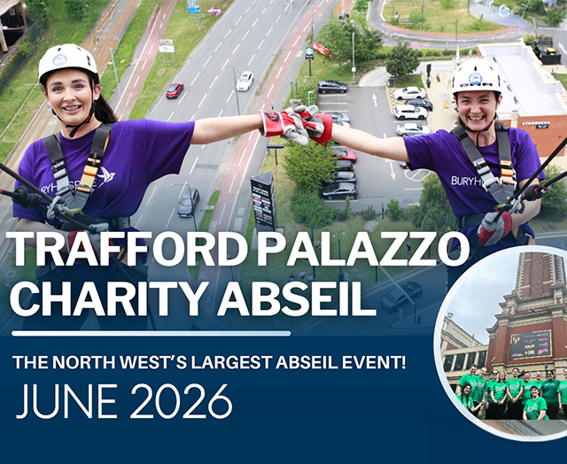 Two people abseiling down Trafford Palazzo with the words Trafford Palazzo charity abseil the North West's largest abseil event! June 2026