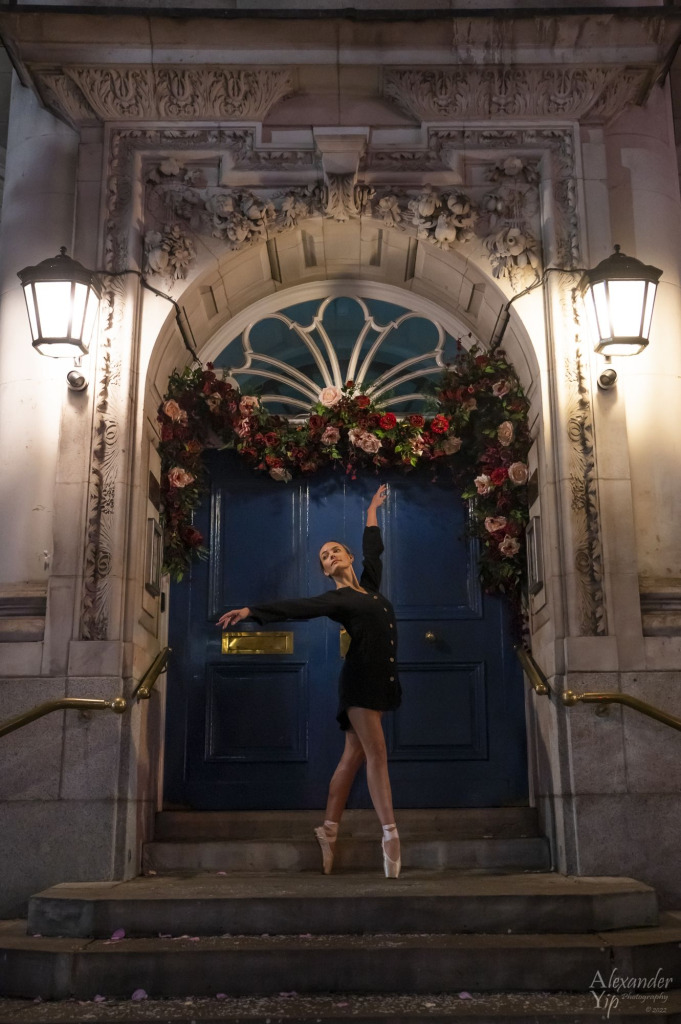 Woman dancing in a doorway