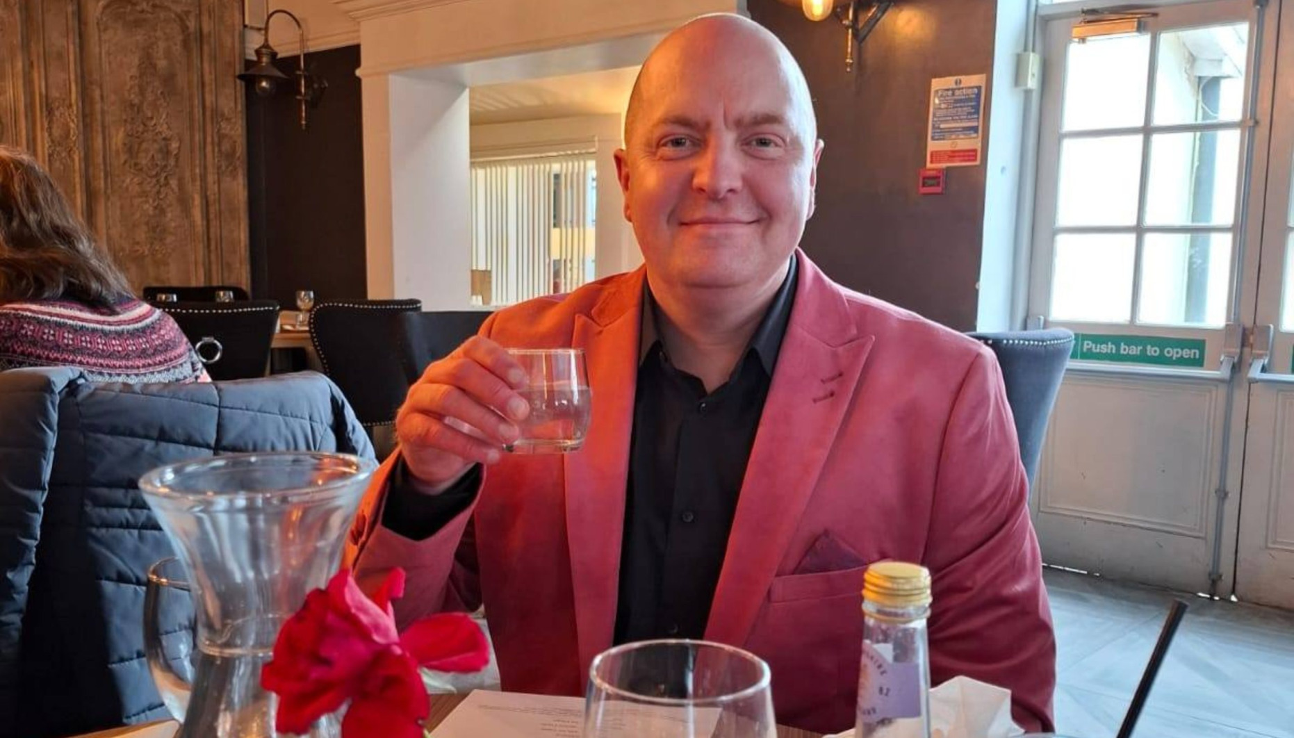 Picture of Andy Lloyd in pink suit