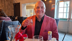 Picture of Andy Lloyd in pink suit