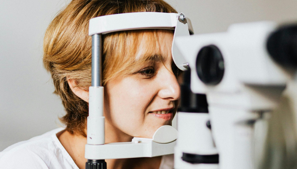 Woman getting eyes tested