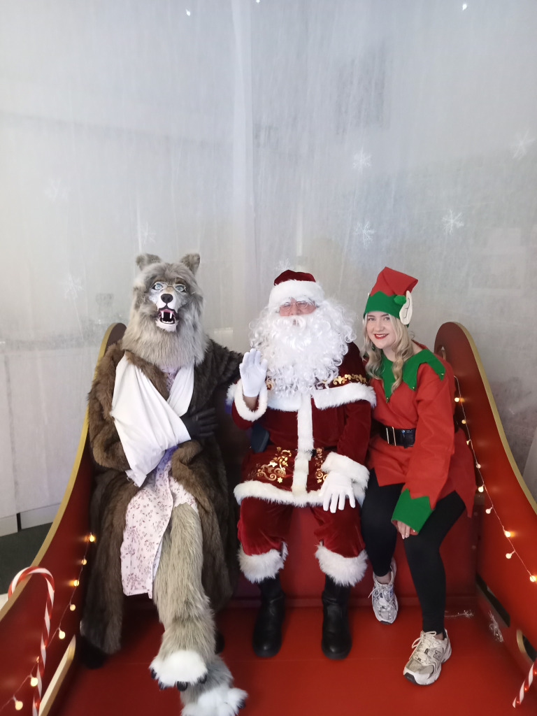 Chris at Christmas event dressed as wolf