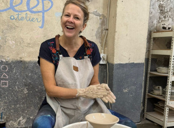 Woman doing pottery making.