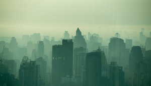 A smog of pollution hanging over a city