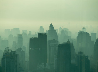 A smog of pollution hanging over a city