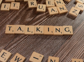 Tiles spelling the word 'Talking'