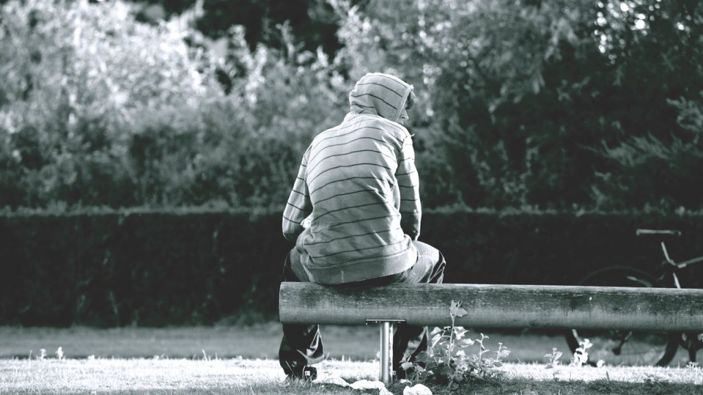 Lonely Child sat on a bench.