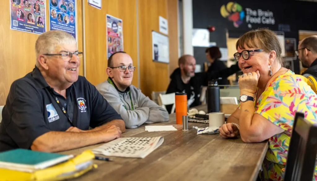 People chatting at a table
